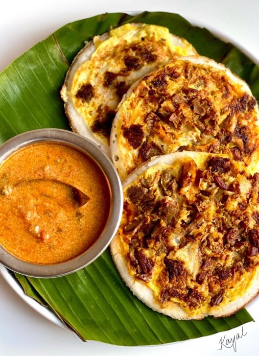 South Indian curry dosa with crispy dosa crepe, potato masala filling, coconut chutney, and sambar.
