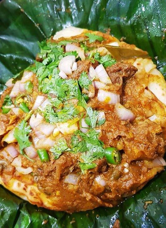 South Indian Restaurant curry dosa with crispy dosa crepe, potato masala filling, coconut chutney, and sambar.